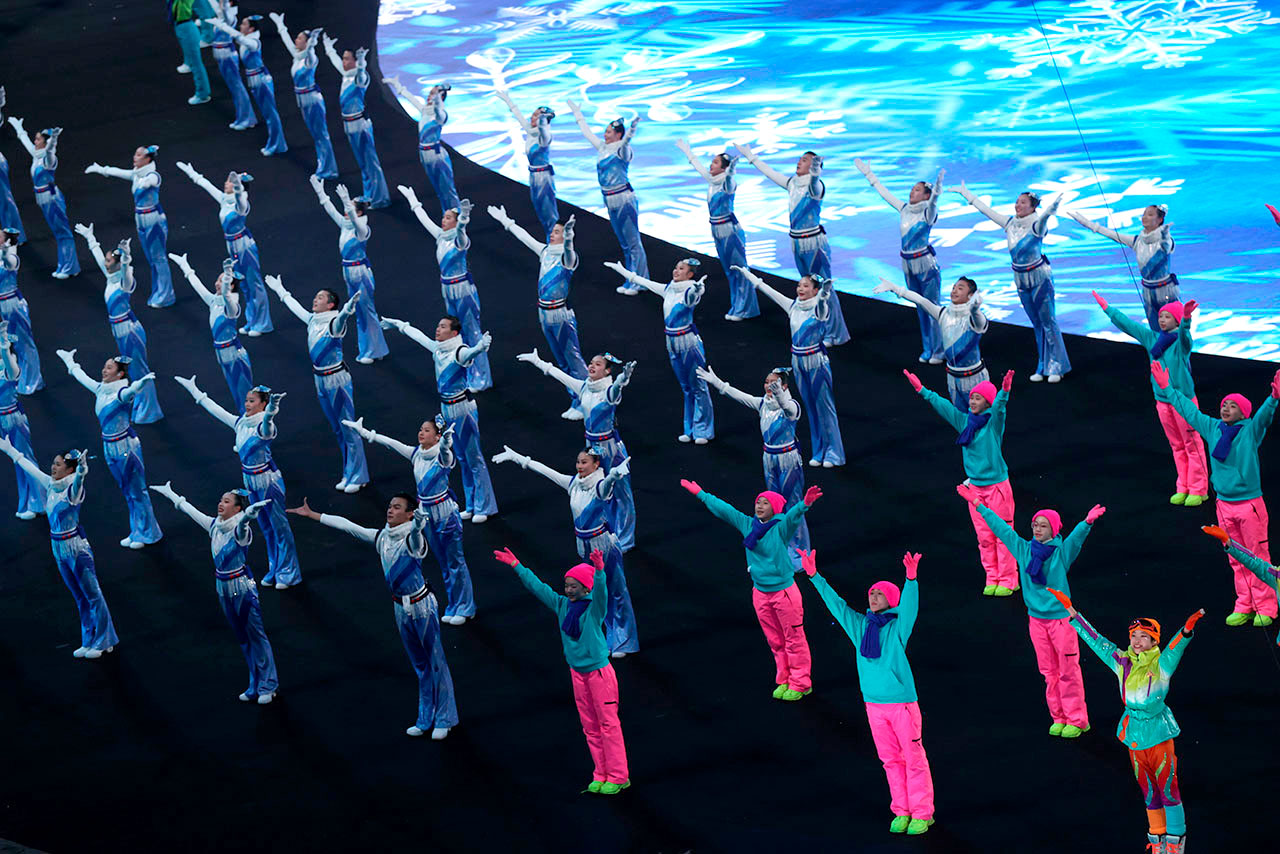 BEIJING, CHINA - FEBRUARY 04: Performers dance in formation during the Opening Ceremony of the Beijing 2022 Winter Olympics at the Beijing National Stadium on February 04, 2022 in Beijing, China. (Photo by Julian Finney/Getty Images)